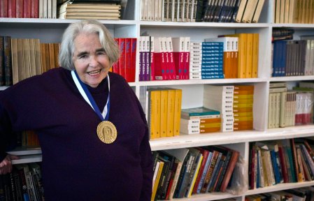 L9307142 copy 3.jpg now an elder Kate Millet wears medal she received in 2013 when she was inducted into National Women's Hall of fame